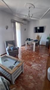 a living room with a couch and a table at El Molinero in Monesterio