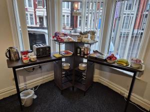 two tables in front of a window with food at Glendor Hotel in Blackpool +59 photos