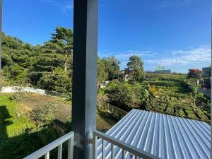 a view from the balcony of a house at infinite 88 villa in Batu
