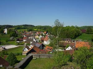 an aerial view of a small town with houses at Haus Burgblick in Obertrubach