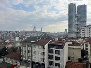 a view of a city with tall buildings at Kent Suites Hotels Ataşehir in Istanbul