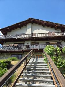 a stairway leading up to a house with a building at L'Atelier du Temps - Moline Paradiso in Cogne