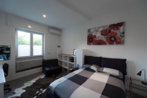 Postel nebo postele na pokoji v ubytování B&B Rosa Blu