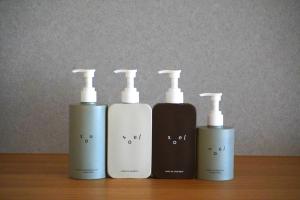 a group of four bottles sitting on a table at Tousumi in Fukuoka