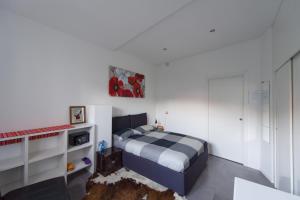 Postel nebo postele na pokoji v ubytování B&B Rosa Blu