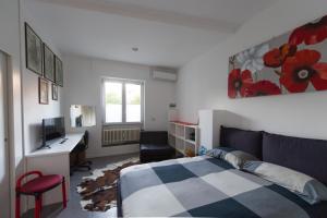 Postel nebo postele na pokoji v ubytování B&B Rosa Blu