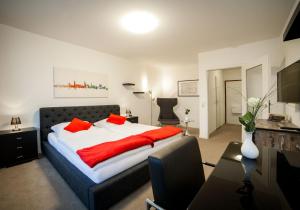 Postel nebo postele na pokoji v ubytování Eilenriedestift Hotel