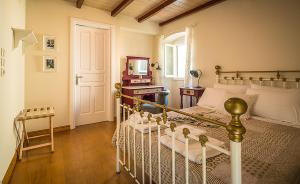 Ένα ή περισσότερα κρεβάτια σε δωμάτιο στο Castelli Cottage +69 φωτογραφίες