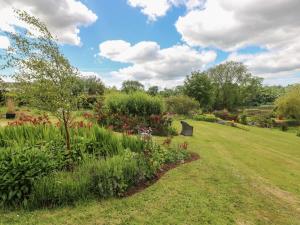 a garden with flowers and plants in a field at Garden View in Pembroke