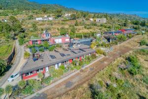 an aerial view of a house with a train at Hotel Rural Los Piratas in Tijarafe