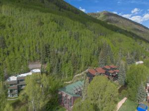 an aerial view of a resort on a mountain at Manitou Lodge 11 by Alpine Lodging Telluride in Telluride +7 photos