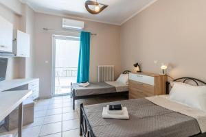 En eller flere senge i et værelse på VNM Apartment