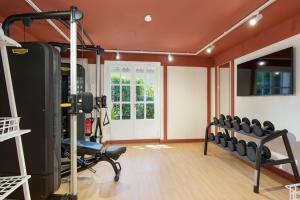 a gym with a bunch of chairs in a room at La Bastide de Mougins, a Tribute Portfolio Hotel in Mougins