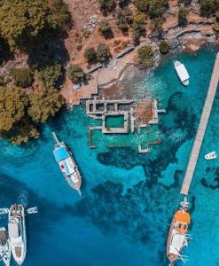 a group of boats in a body of water at Dalaman Airport Suite 11 in Dalaman