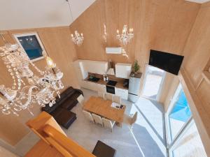 an overhead view of a living room with a dining table at Vila Porto Olive Heated Pool near Piran & Portorož in Portorož