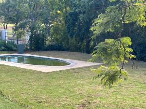 a small pond in the middle of a yard at 13 bedford street in Grahamstown