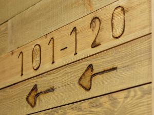 a wooden sign with the number on it at Ibis Budget Oviedo in Oviedo