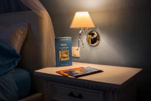 A bed or beds in a room at A Casa Di Lilly
