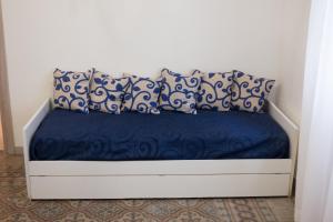 A bed or beds in a room at A Casa Di Lilly