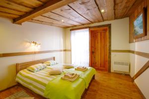 Postel nebo postele na pokoji v ubytování Guest House and camping Jurmala