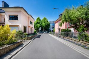 an empty street in a city with buildings at 2 bedroom flat Bonnevoie - sleeps 7 in Luxembourg