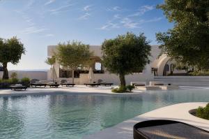 a swimming pool with benches and trees next to a building at Mamay Hotel in Fira
