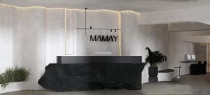 a lobby with a desk with a way sign on the wall at Mamay Hotel in Fira +196 photos