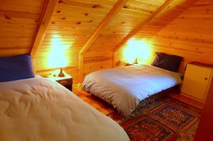 Säng eller sängar i ett rum på Anglo-Polish Holidays