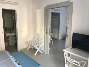 TV a/nebo společenská místnost v ubytování Al Parco Primavera B&B