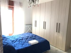 Voodi või voodid majutusasutuse Supera Napoli Apartment toas