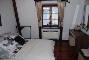 Posteľ alebo postele v izbe v ubytovaní ApartHome Barbara 1