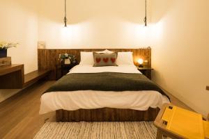 Letto o letti in una camera di Haku Beach Days Inn