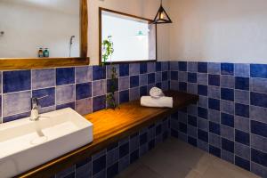 Bagno di Haku Beach Days Inn