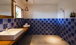 Kúpeľňa v ubytovaní Haku Beach Days Inn