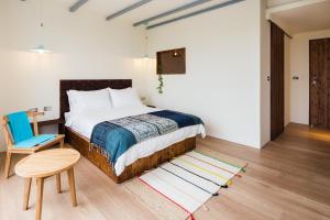 Letto o letti in una camera di Haku Beach Days Inn