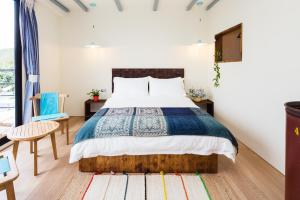 Letto o letti in una camera di Haku Beach Days Inn
