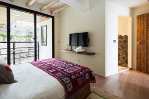 Letto o letti in una camera di Haku Beach Days Inn