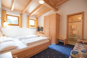 Postel nebo postele na pokoji v ubytování Hotel Jú Furcia + 28 fotografií