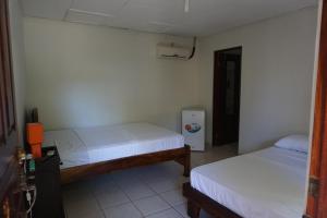Katil atau katil-katil dalam bilik di Villa Vilar