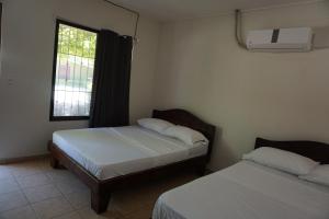 Postel nebo postele na pokoji v ubytování Villa Vilar + 30 fotografií
