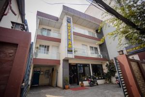 a building with a sign on the side of it at Hotel AB Inn in Kathmandu