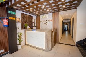 a lobby of a building with a reception counter at Hotel AB Inn in Kathmandu