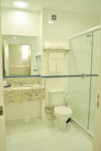 Et badeværelse på Villa Premium Hotel