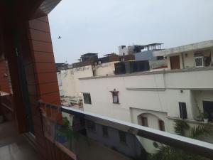a view from the balcony of a building at Kaushal residency in New Delhi