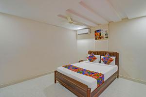 a bedroom with a bed in a room at Via Silver Suites in Hyderabad