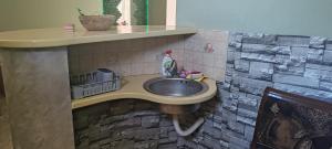 a bathroom with a sink in a doll house at DIAstan in Zrenjanin