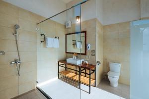 Ett badrum på Chillax Inn B&B