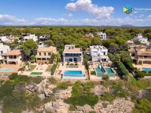 an aerial view of a home with a swimming pool at Villa Sa Troneta in Cala Pi