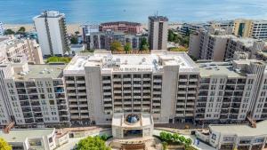 an aerial view of a large building in a city at Royal Beach Apartments in Sunny Beach