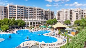 an image of a large swimming pool in a resort at Royal Beach Apartments in Sunny Beach